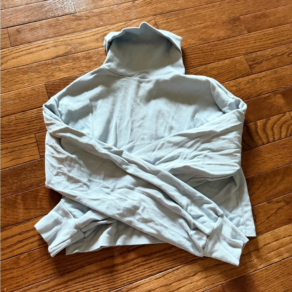 Cropped baby blue turtleneck sweater